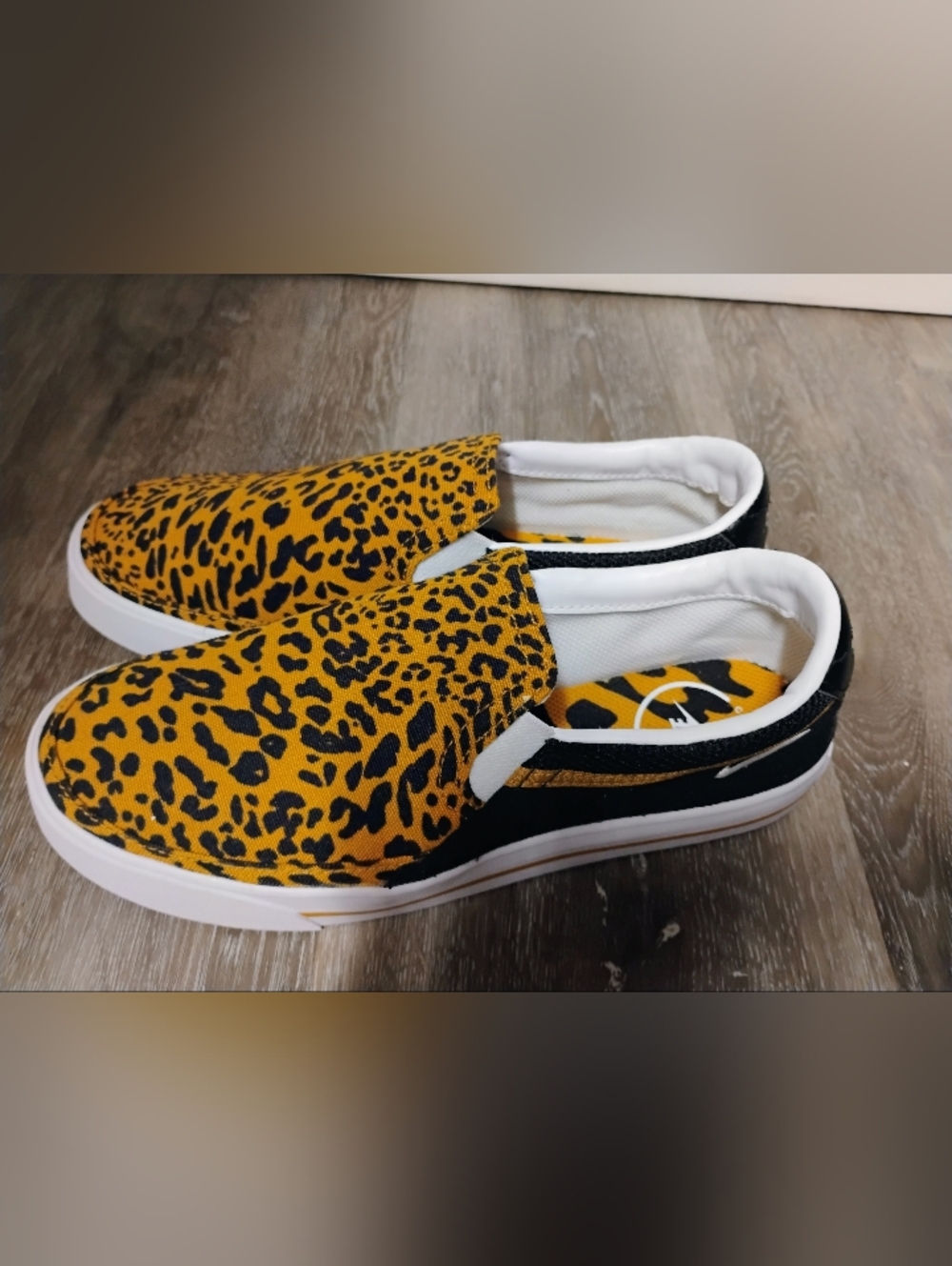 Nike Women’s Slip-On Sneakers in Yellow Leopard Print with Black Accents